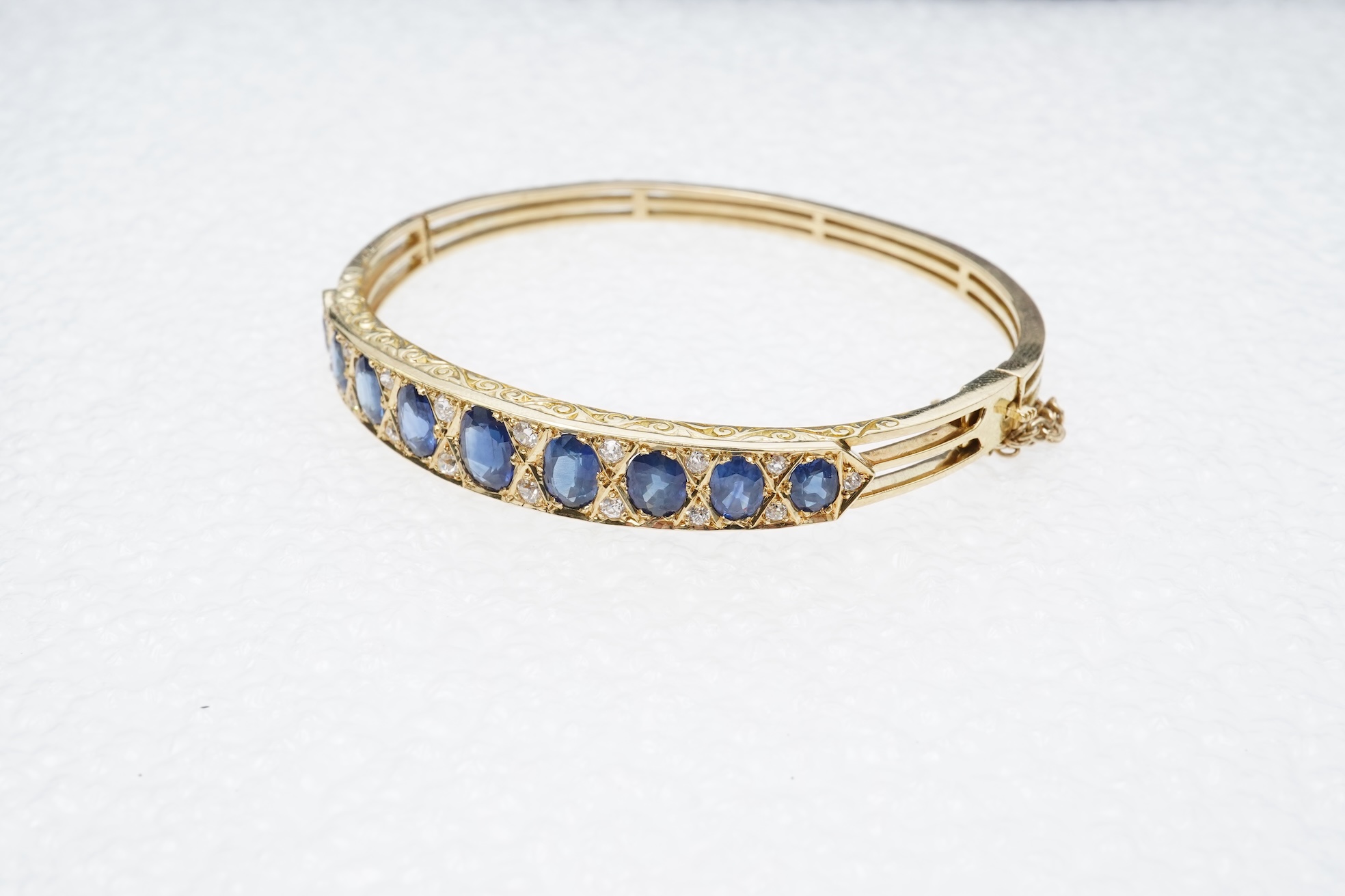 A sapphire and diamond bangle